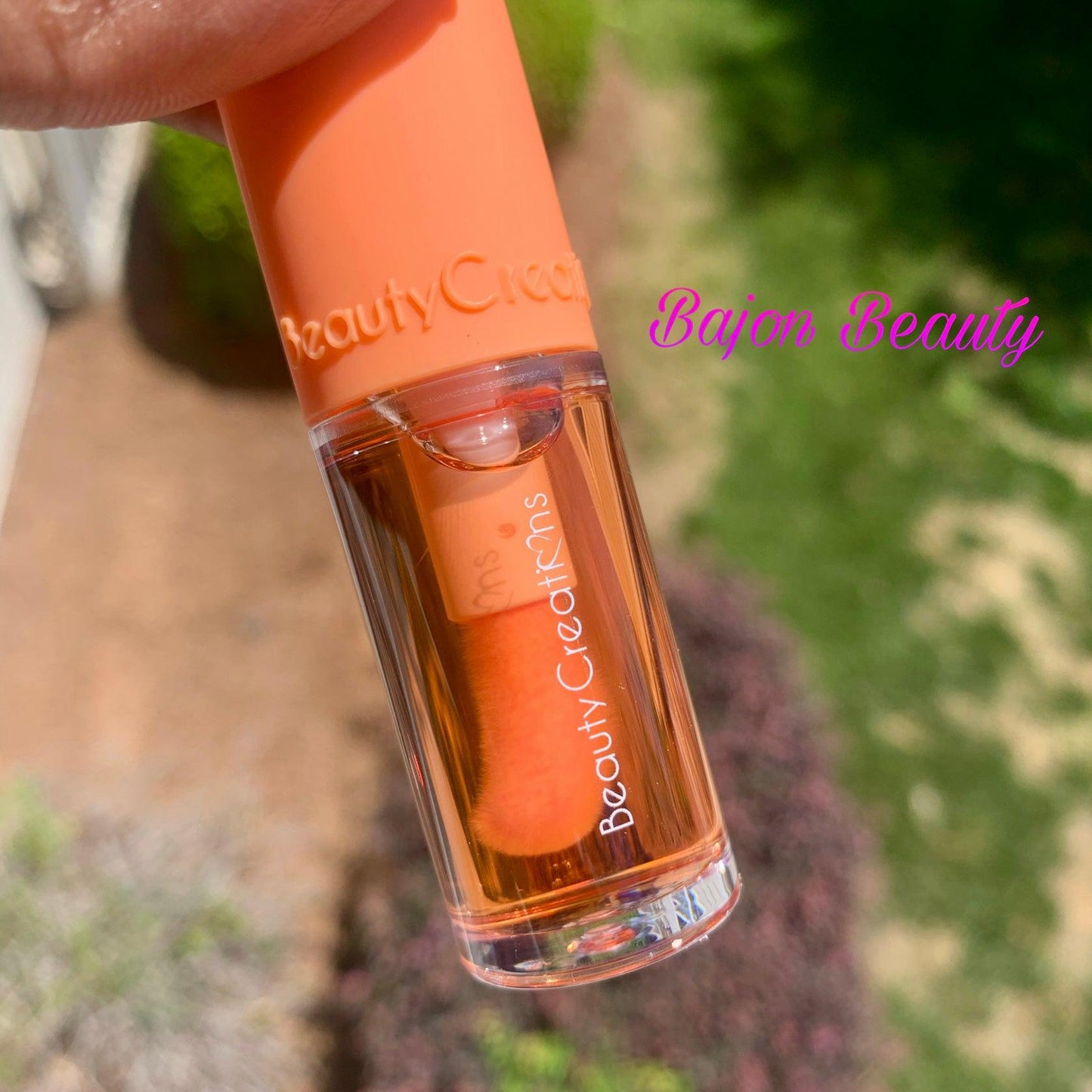Peach Hydrating lip oil with a lip PH tint.