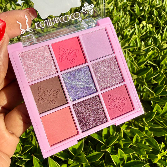 Colorful eyeshadow palette with pink, brown and shimmer shades