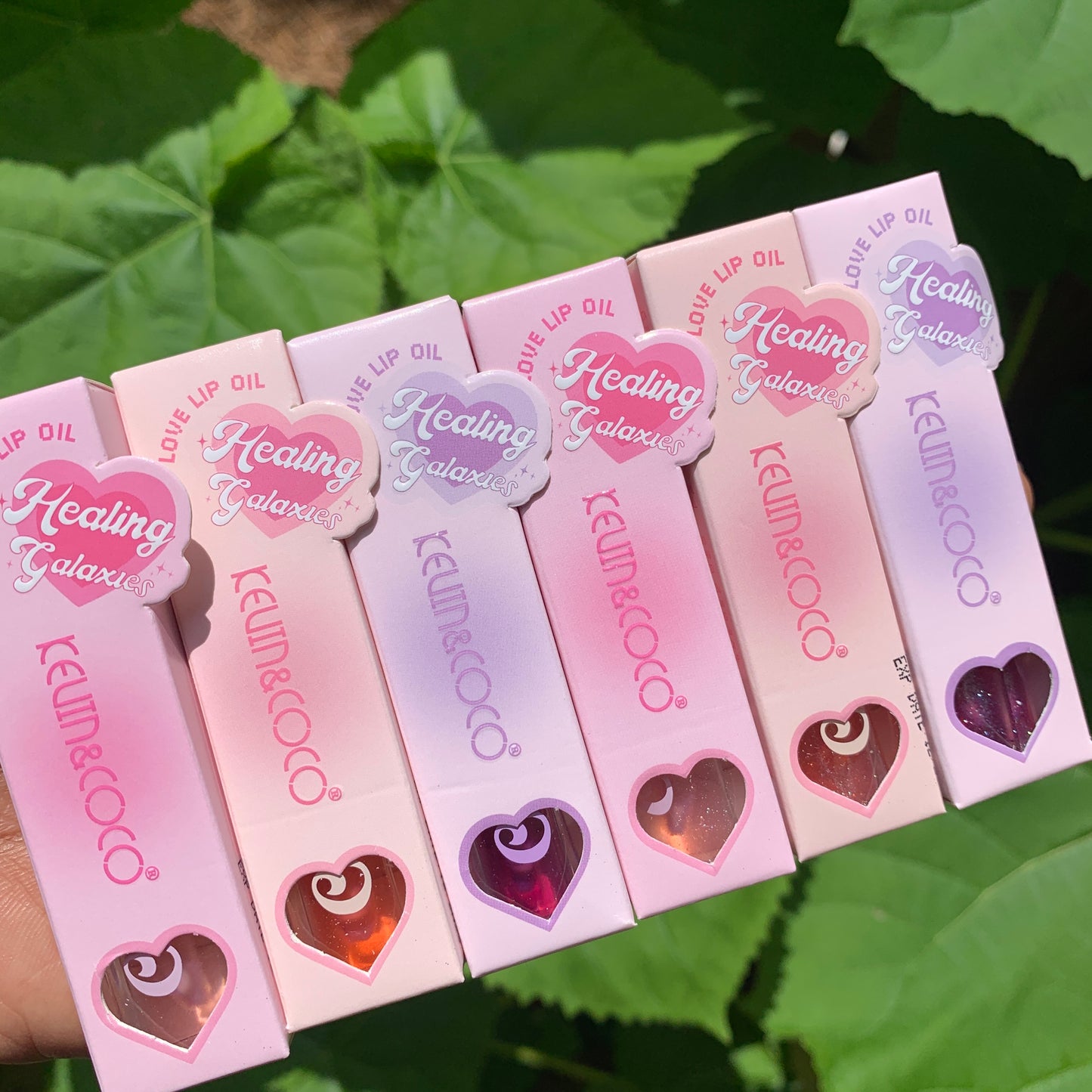 Hydrating lip oil in sleek tube with glossy applicator