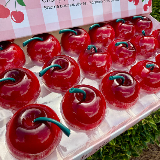 Red cherry-shaped lip balms 