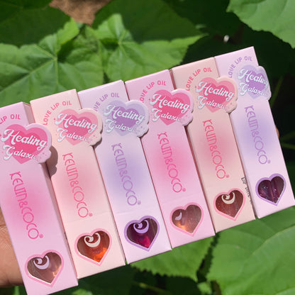 Hydrating lip oil in sleek tube with glossy applicator