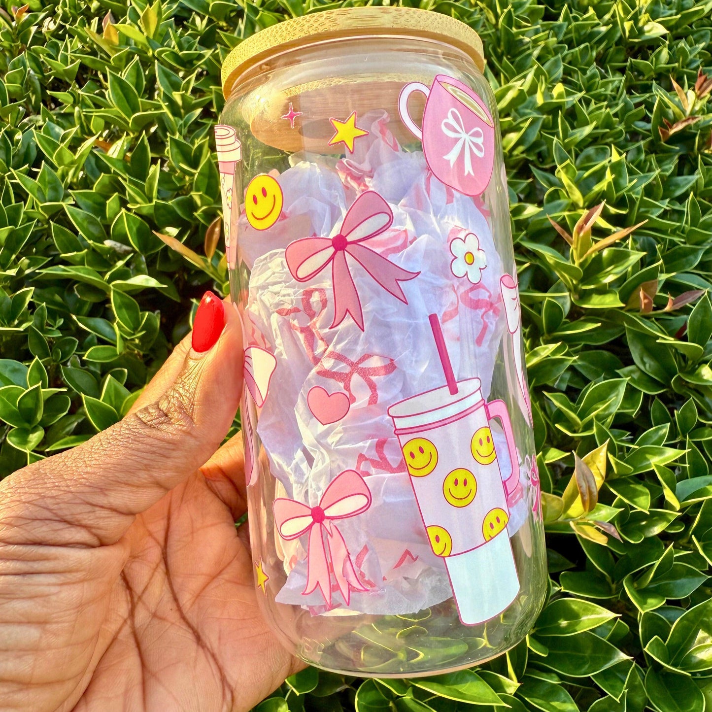 coffee glass cup with pink and yellow designs 