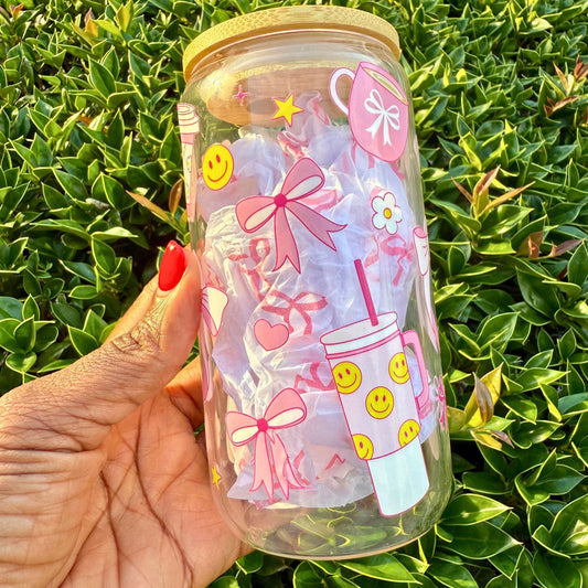 coffee glass cup with pink and yellow designs 
