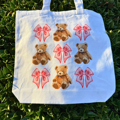 White shoulder bag with teddy bears and pink bows 